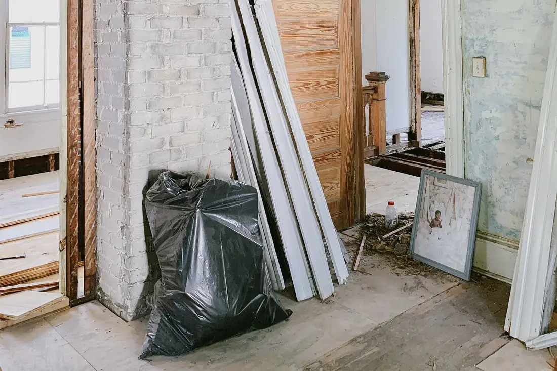 Exposed beams and brick during renovation